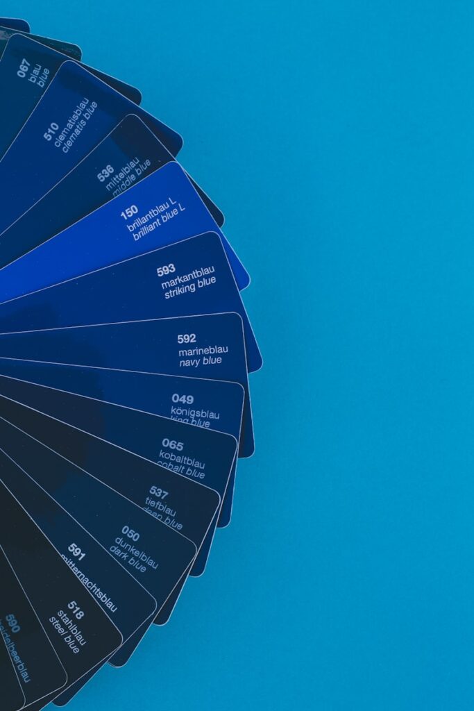 blue and white hand fan